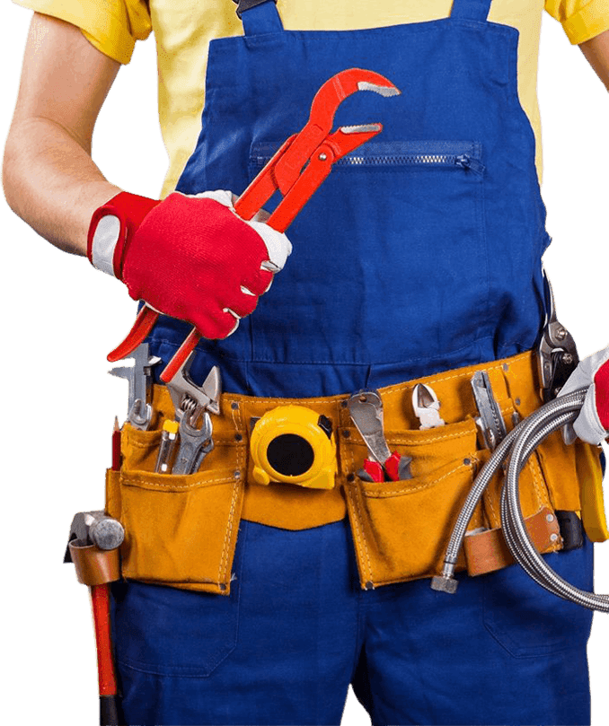 Plumber with tool belt standing in bathroom